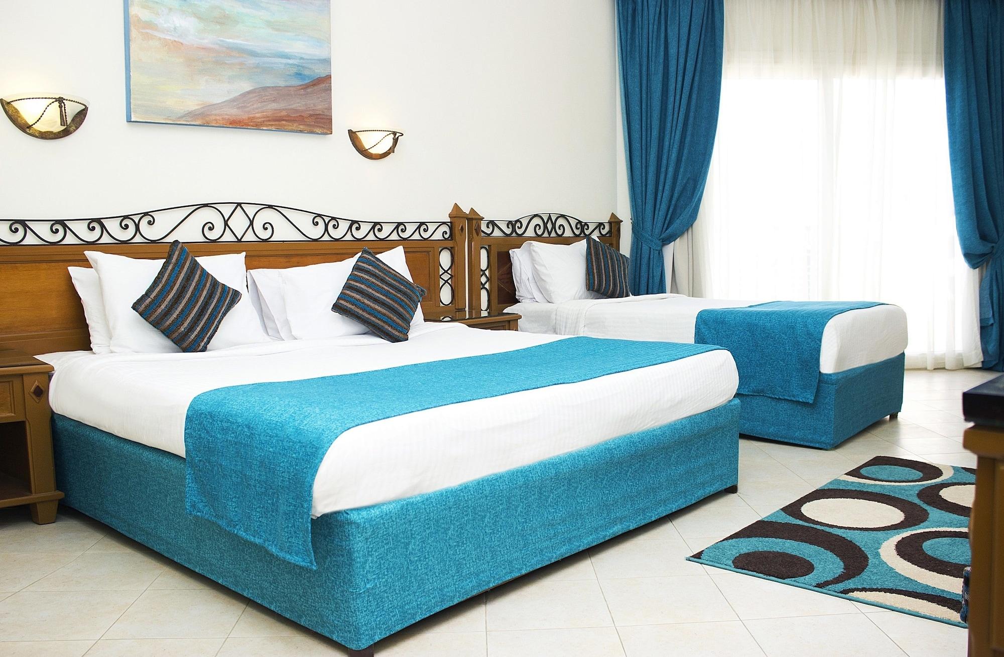 Pyramisa Beach Resort Sahl Hasheesh Hurghada Esterno foto A bedroom in a hotel